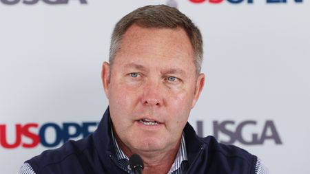 Mike Whan talks to the media before the 2022 US Open