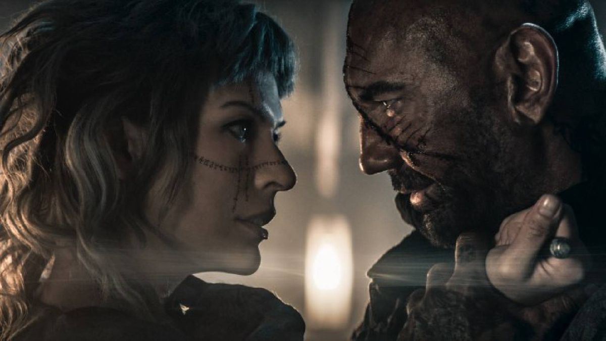 Dave Bautista and Milla Jovovich in In the Lost Lands 