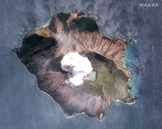 A satellite image of New Zealand's White Island on Dec. 11, 2019, three days after the volcano erupted.