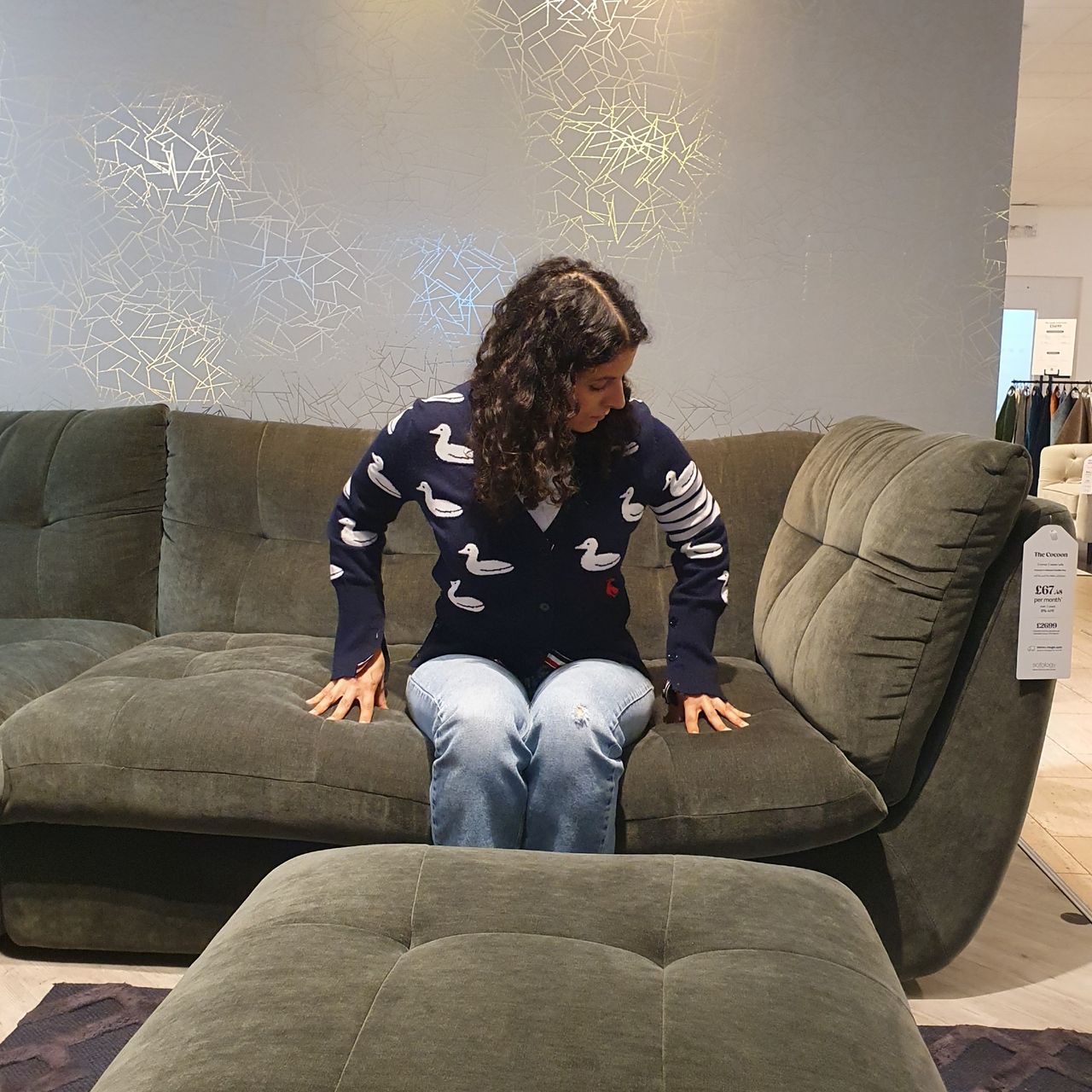 Ideal Home's Content Editor, Sara Hesikova testing a modular sofa