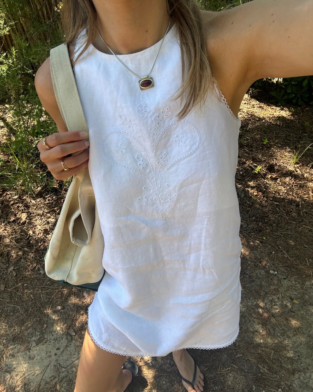 Picture of a Anna Winck posing for summer in white dress
