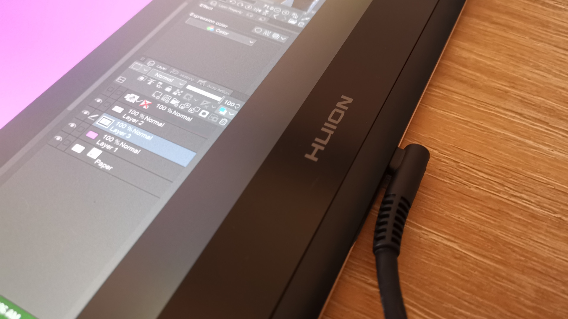 The logo displayed on the side of the Huion Kamvas Pro 16