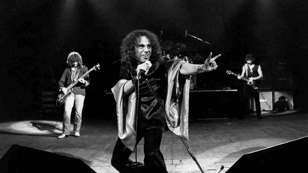 Black Sabbath performing onstage in the early 1980s