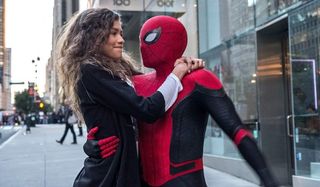 Spider-Man: Far From Home MJ and Peter on a sidewalk, getting ready to swing into the sky