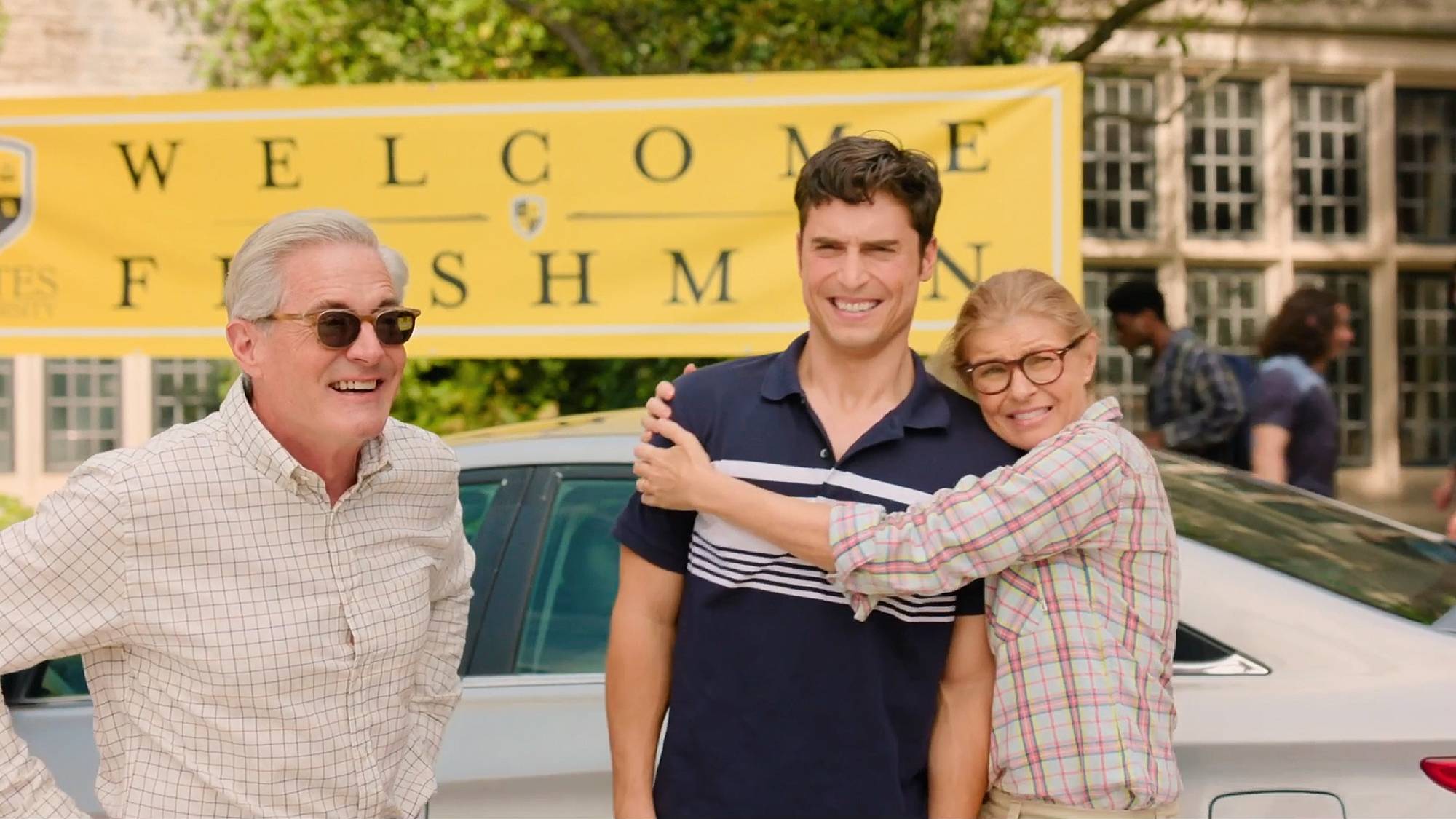 Kyle MacLachlan, Benny (Benito Skinner), and Connie Britton in "Overcompensating" on Prime Video