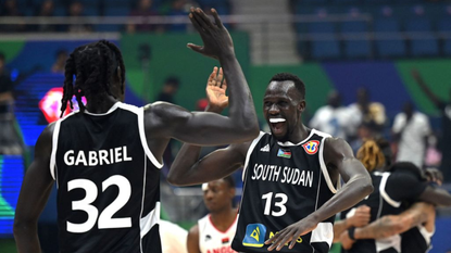 Members of South Sudan&#039;s basketball team celebrate after winning a world cup match against Angola last year