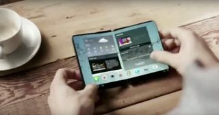 A still from a 2014 Samsung concept video shows off a foldable phone.