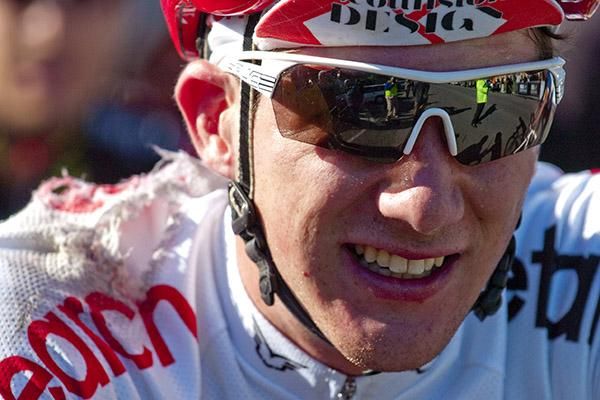 Scott Liston (Search2Retain) waits to re-join the race after falling in a multiple rider pile-up on stage one.