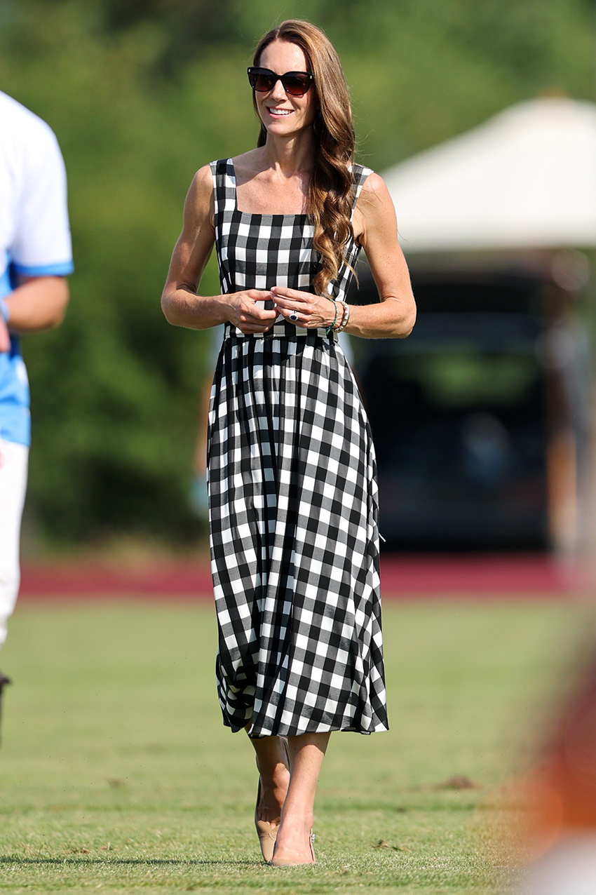 Kate Middleton wearing an A-line black-and-white gingham dress and slingback nude pumps at a charity polo match