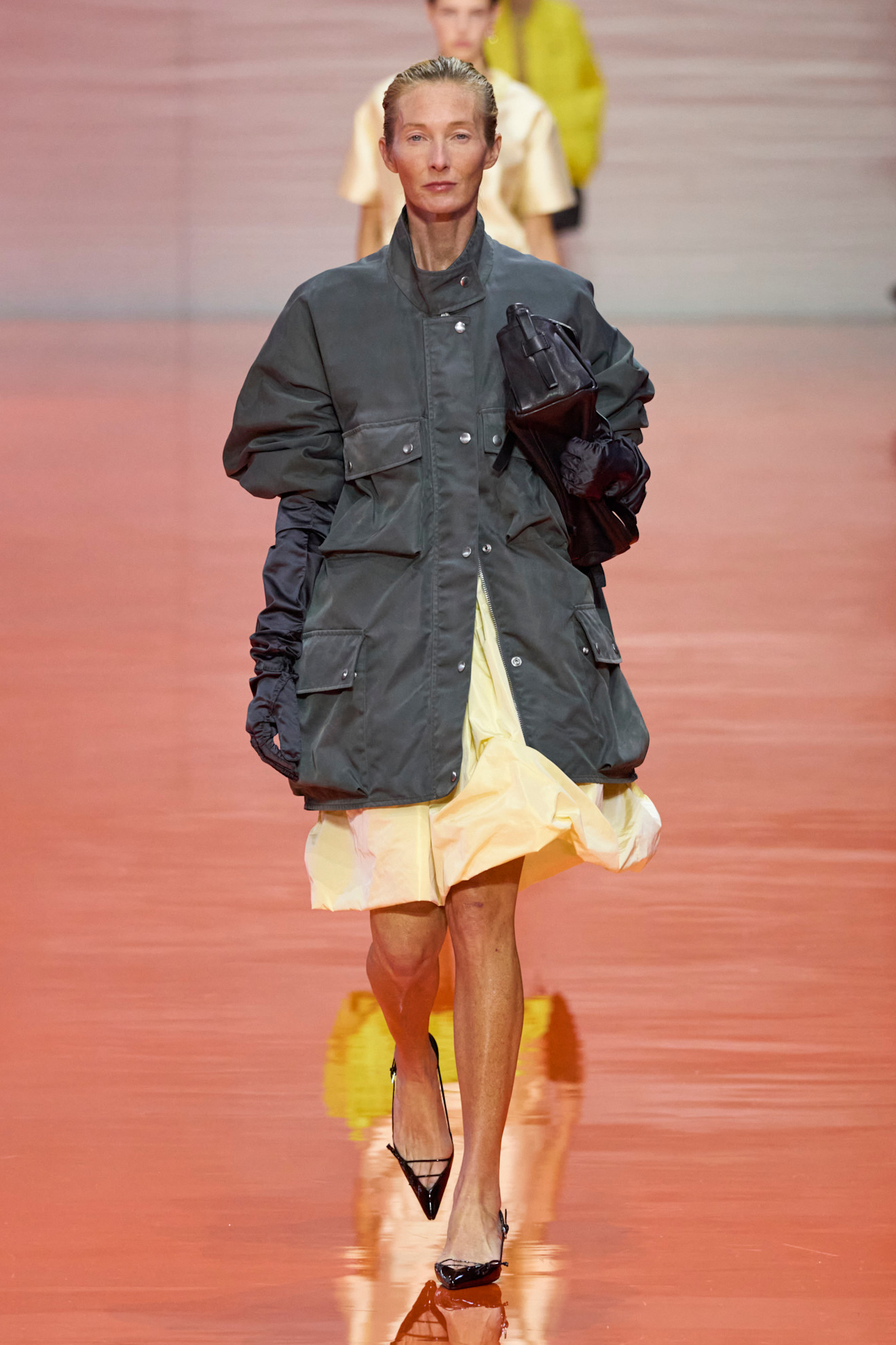 An image of a cargo jacket, one of the biggest spring jacket trends, on the Prada spring/summer 2026 runway.