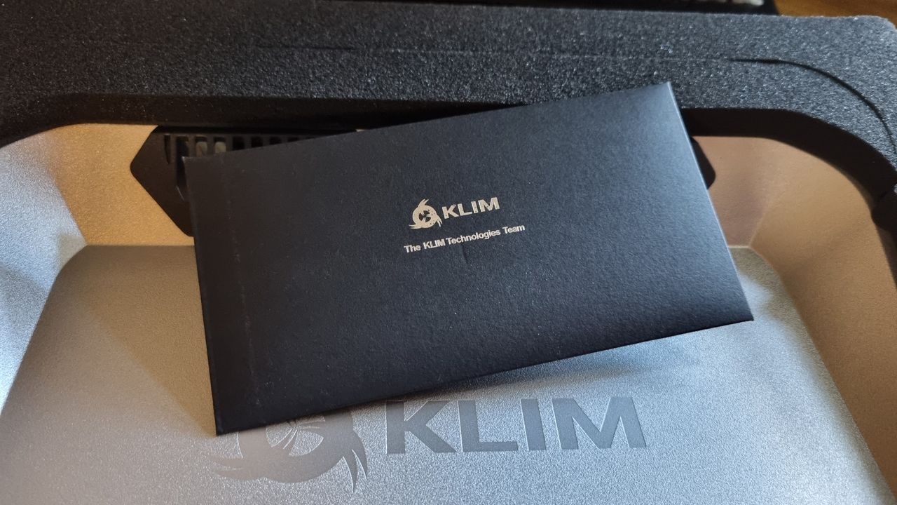 Assorted images of the Klim Everest laptop cooler, and everything included inside the box
