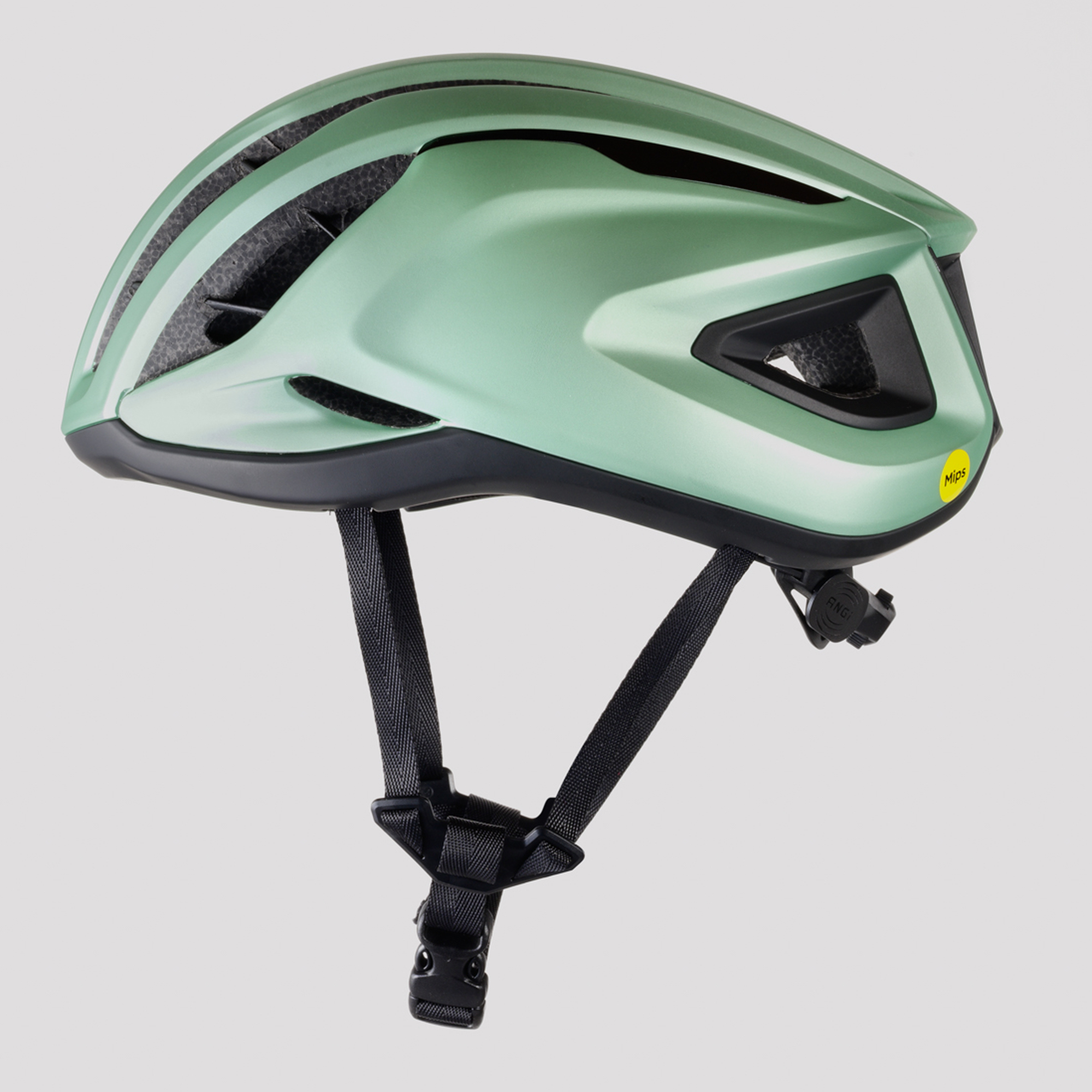 A green Specialized Prevail III helmet facing to the left, on a plain background