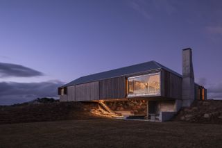 bass coast farmhouse nighttime exterior