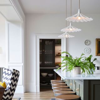 classic kitchen design with ceramic fluted island lighting