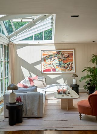 Sunroom with a modern living room