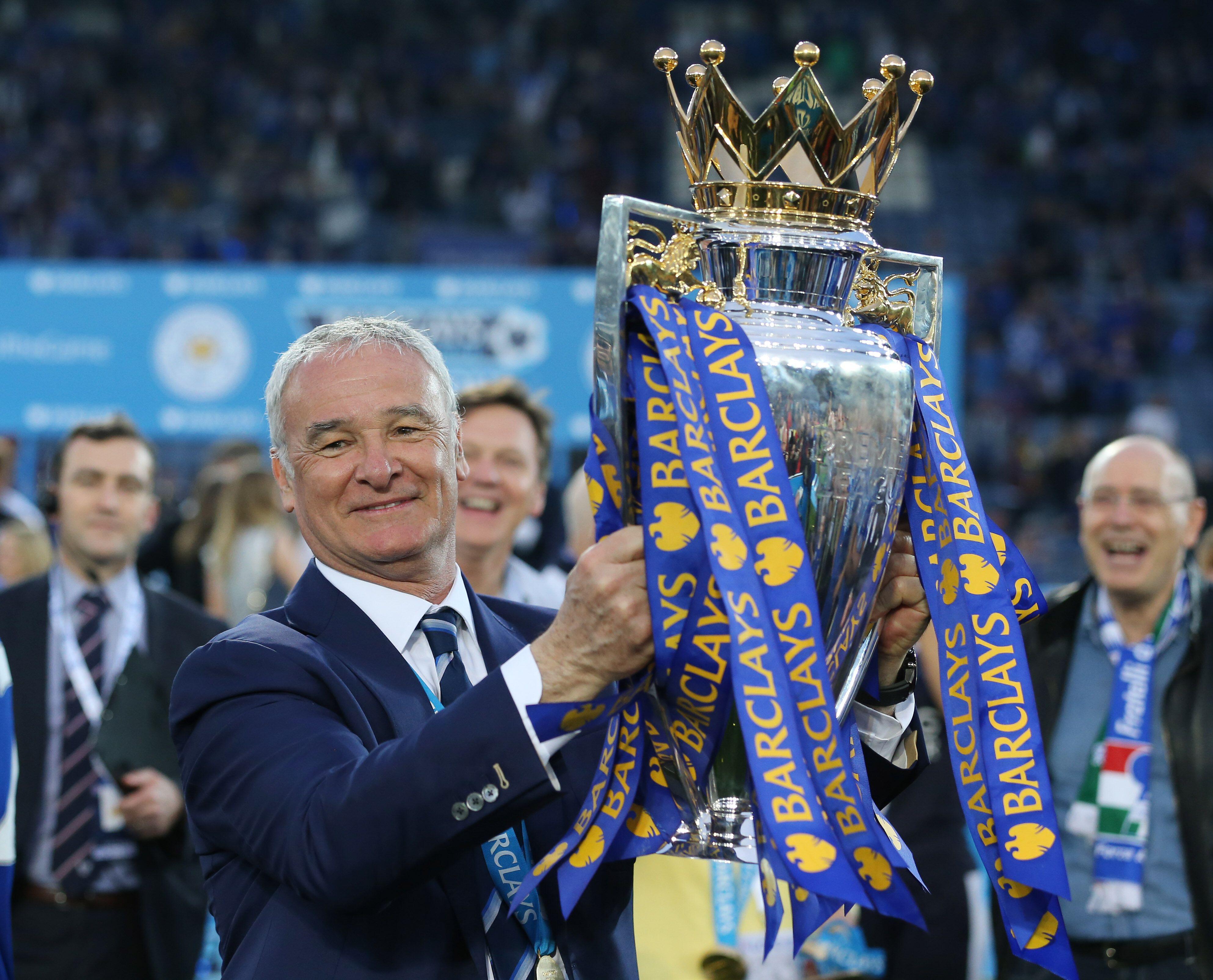 Claudio Ranieri lifts the Premier League trophy as Leicester City manager, 2016