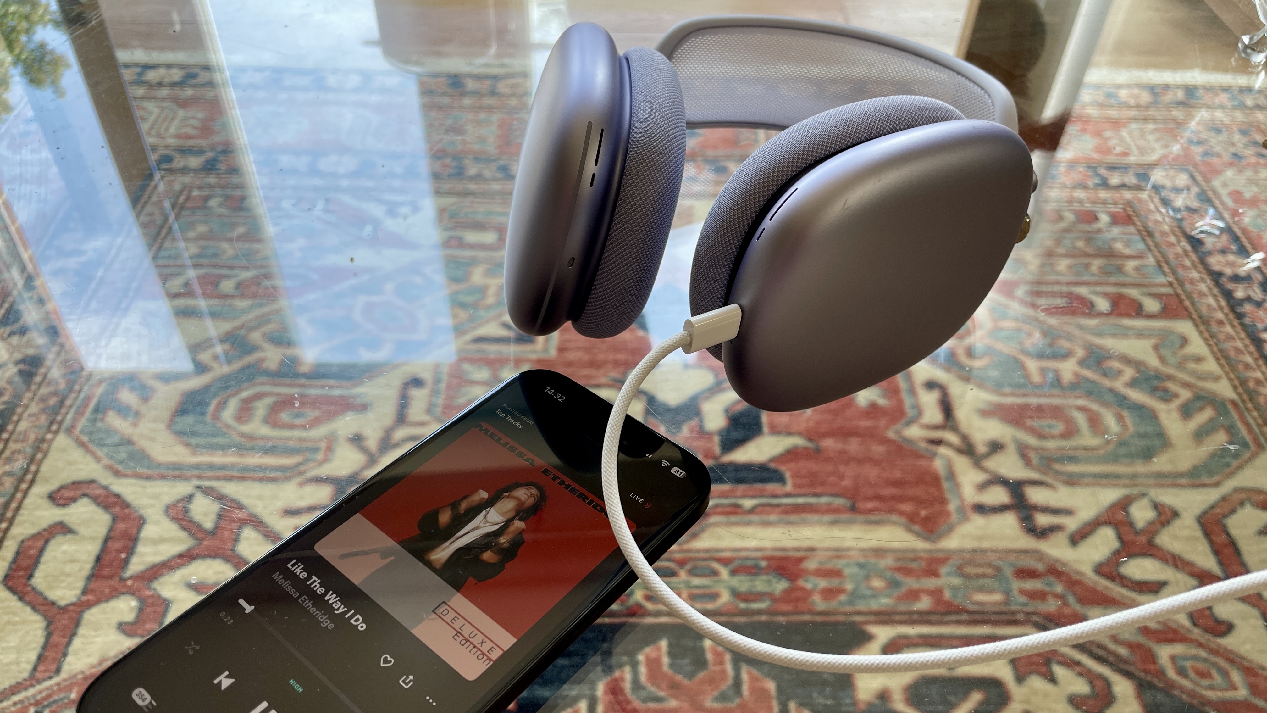 AirPods Max in purple hooked up to a source via USB-C