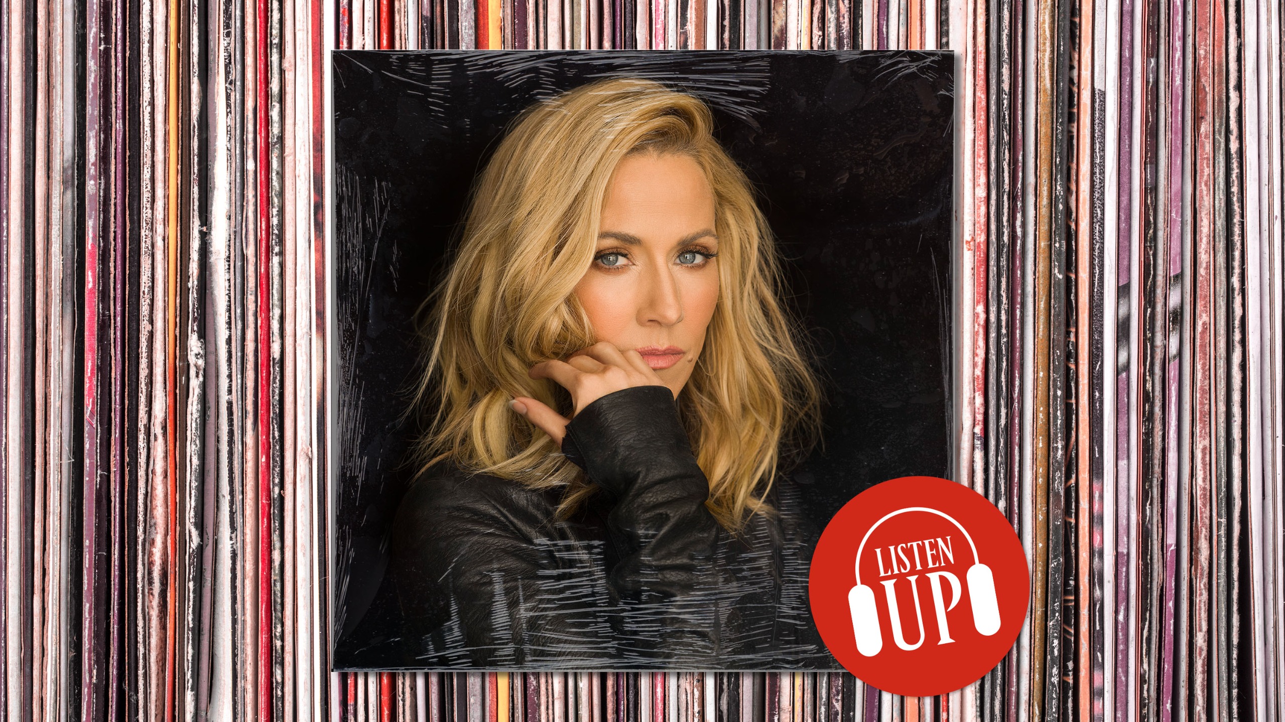 a headshot of singer sheryl crow wearing a leather jacket and resting her chin in her hand with the logo for the marie claire franchise listen up