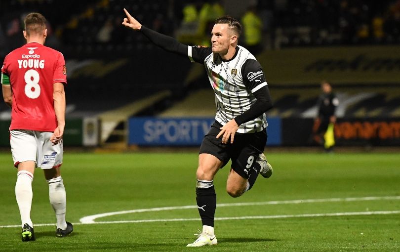 Macaulay Langstaff celebrates scoring against Wrexham last season