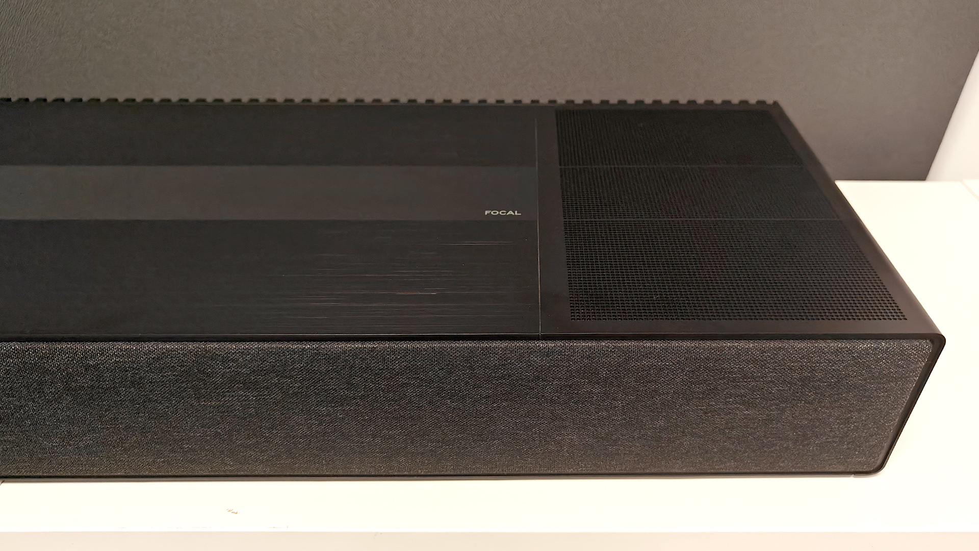 Focal Mu-so Hekla soundbar end of bar/unit on white surface