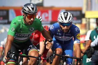 Peter Sagan congratulates Fernando Gaviria as they cross the line during stage 4 at the Tour de France