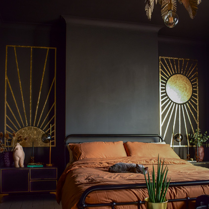 bedroom with black wall and side table