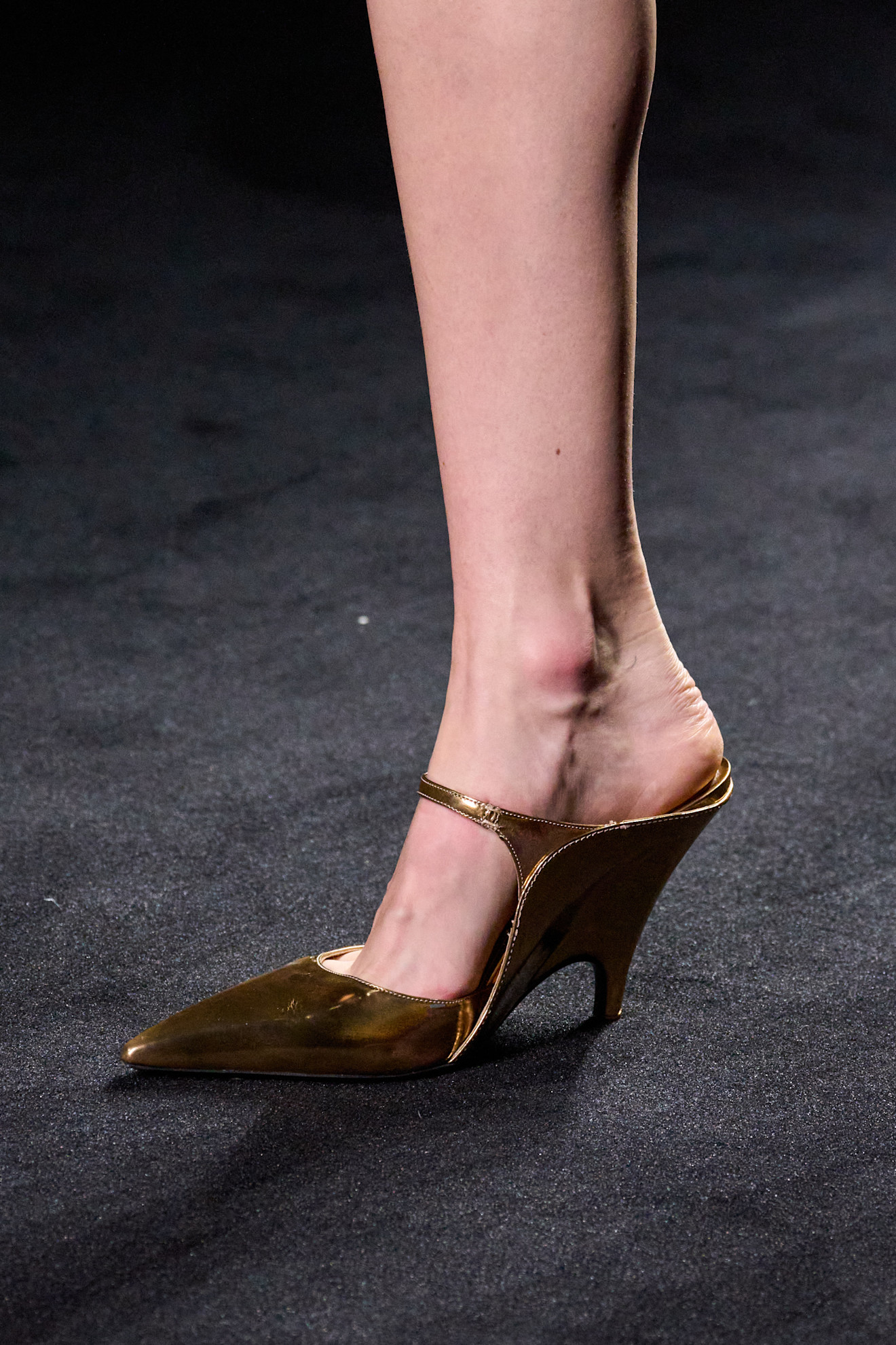 A model wore Mary Jane mules on the Ferragamo Fall 2026 runway