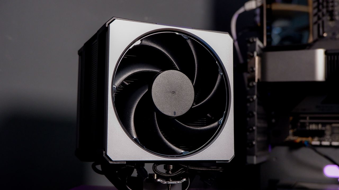 A Cooler Master Hyper 612 Apex on a desk and installed on a gaming PC.