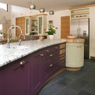 Kitchen with plum island and granite worksurface