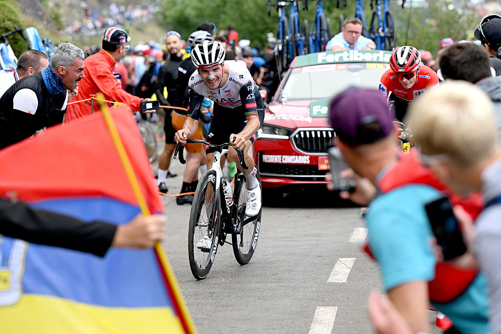 L&#039;ANGLIRU, SPAIN - SEPTEMBER 05: Stage winner Joao Almeida of Portugal and UAE Team Emirates - XRG competes climbing to the L&#039;Angliru while fans cheer during the La Vuelta - 80th Tour of Spain 2025, Stage 13 a 203.7km stage from Cabezon de la Sal to L&#039;Angliru 1556m / #UCIWT / on September 05, 2025 in L&#039;Angliru, Spain. (Photo by Dario Belingheri/Getty Images)