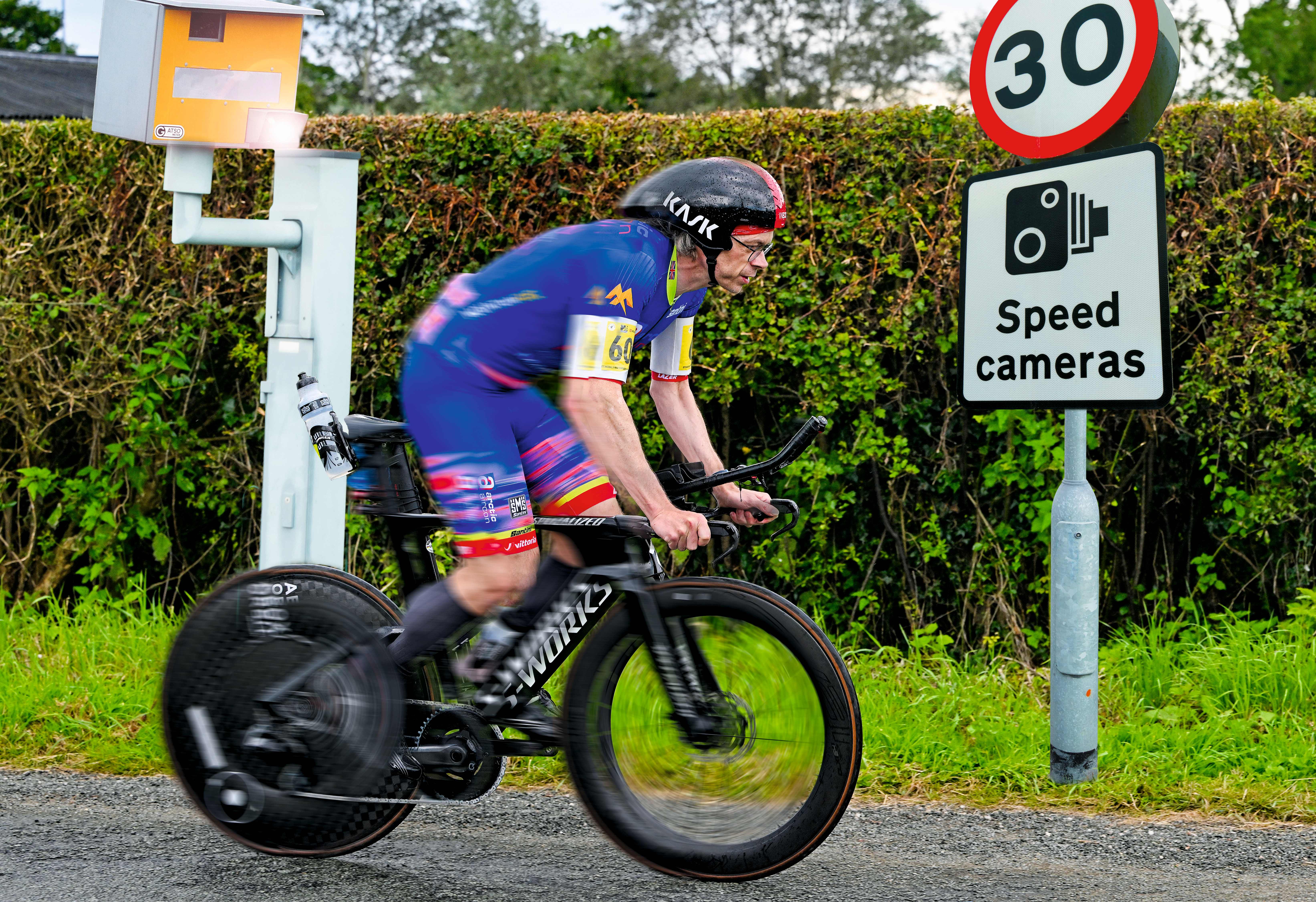 Man cycles past speed cameras