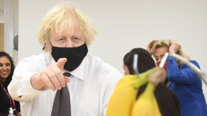 Boris Johnson on a visit to Monkey Puzzle Nursery, London