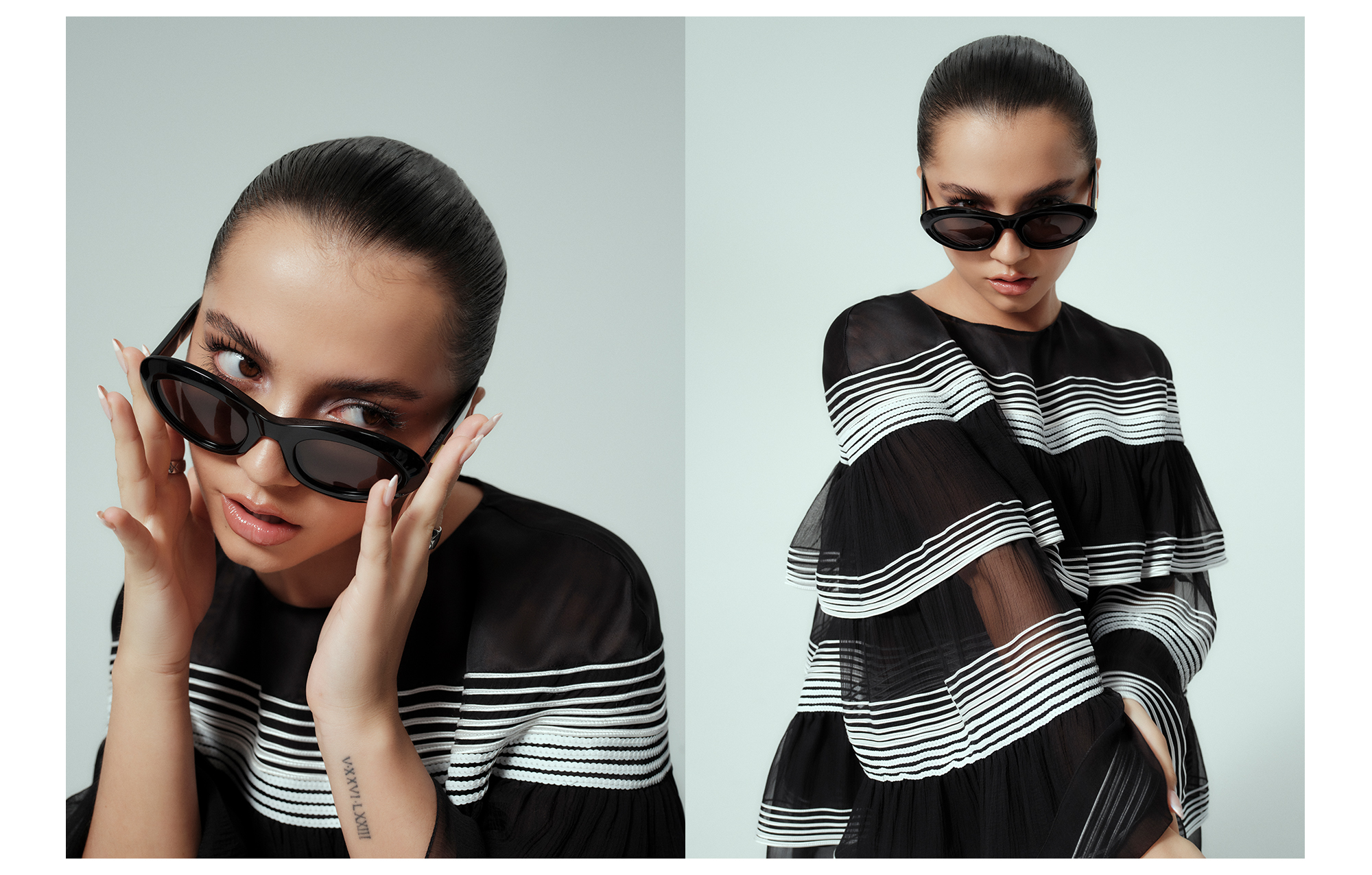 Isabela Merced poses wearing black sunglasses and Chanel black and white stripe dress.