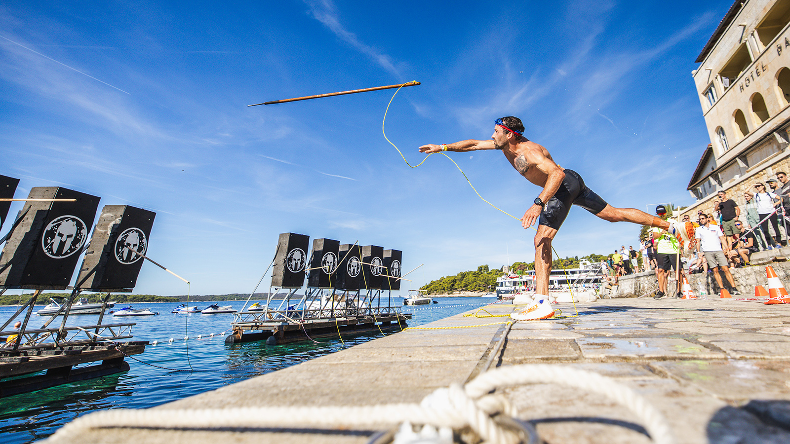 Athlete throwing a spear at floating targets at the 2025 Sprint &amp;amp; 100M World Championship in Hvar, Croatia