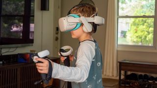 A child playing on a Meta Quest 2 VR headset