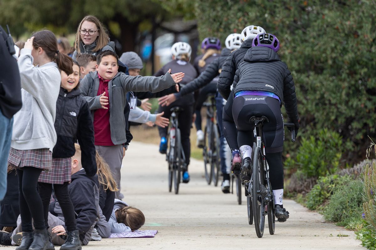 Students from local schools came out to see the riders off at the start of the women's race on stage 2.jpg