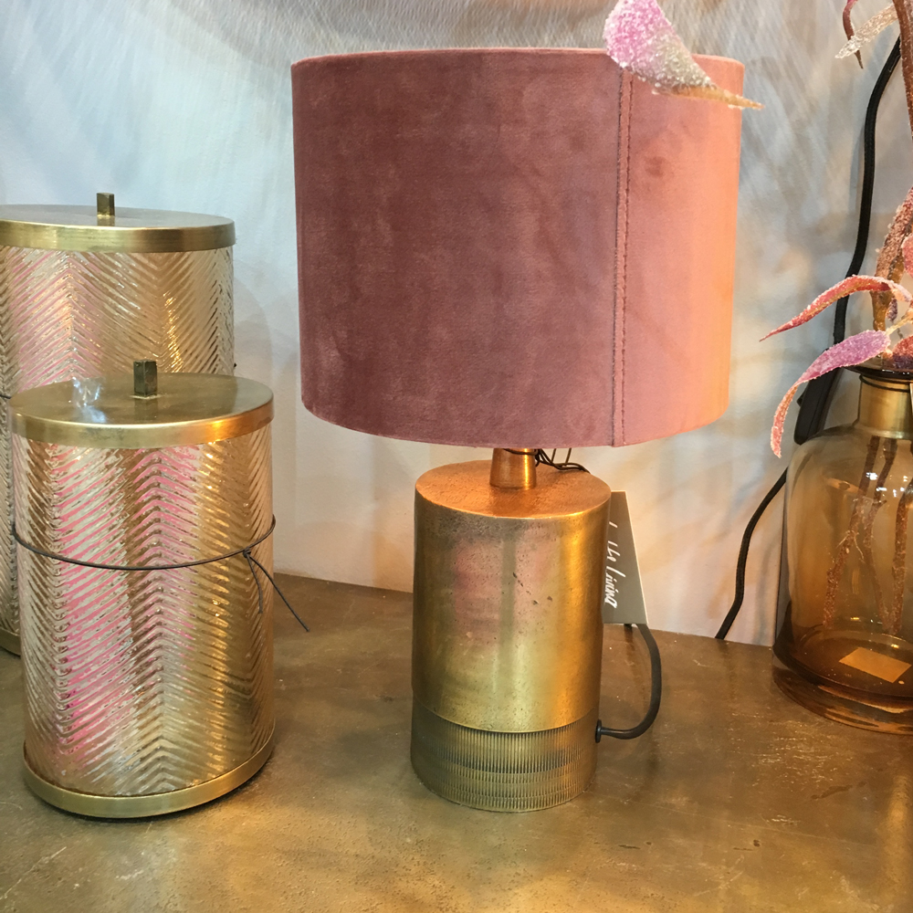 Lamp with candle and white walls