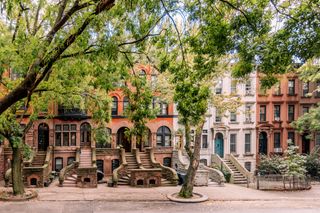 Brownstone row houses in Brooklyn, New York City, USA - stock photo