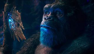 Godzilla looks at his royal axe in the Hollow Earth chamber in Godzilla vs. Kong.
