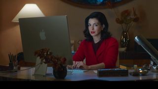Anne Hathaway looking at the camera in Verity.