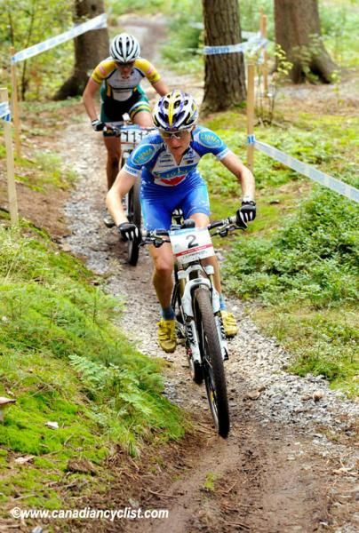 Pendrel passes a U23 rider on her final lap