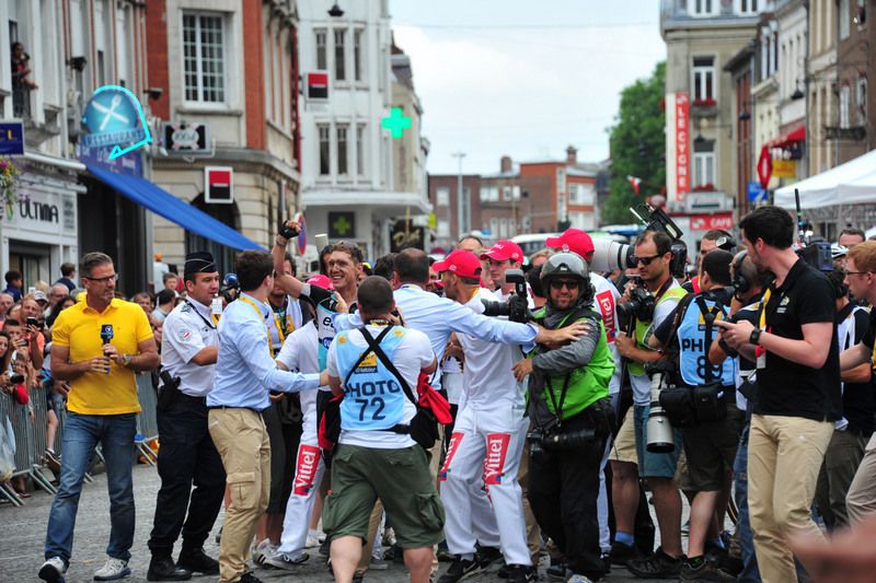 Tony Martin (Etixx-Quick Step) is mobbed after claiming the win