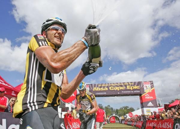 Karl Platt and Stefan Sahm of team Bulls 1 celebrate winning The 2010 Absa Cape Epic during the final stage (stage eight) of the 2010 Absa Cape Epic Mountain Bike stage race held between Oak Valley and Lourensford in the Western Cape, South Africa.