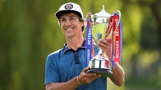 Thorbjorn Olesen with the trophy after his win in the 2022 Betfred British Masters