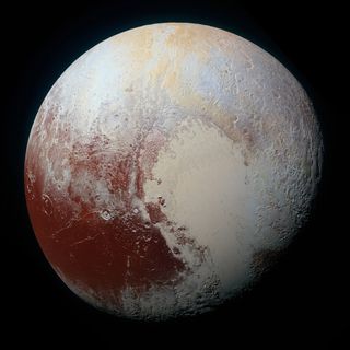 Pluto's polygon-shaped terrain is located in Sputnik Planum, a region that forms the bright, western half of the heart-shaped region near the center of this enhanced image of Pluto from NASA's New Horizons flyby.
