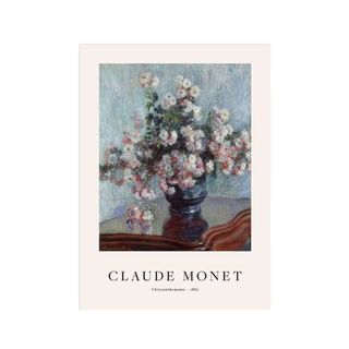 A cream wall art print with a blue painting with a dark blue vase with flowers in the middle and black writing saying 'Claude Monet' on the bottom