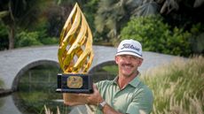 Wade Ormsby holds up the Jakarta International Championship 2025