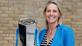 Kelly Smith with the Women's Super League (WSL) trophy