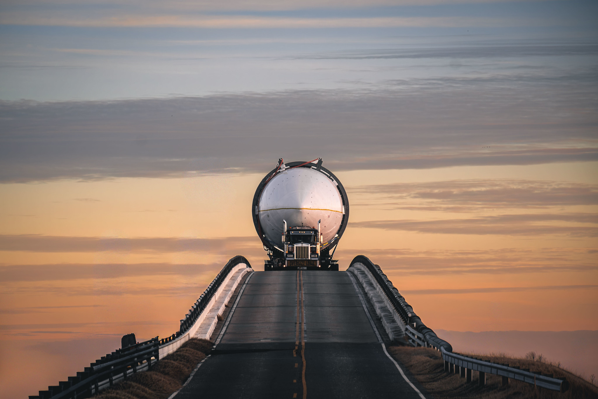 A rocket fairing is being transported