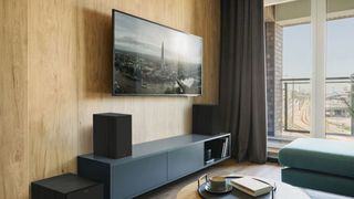 Klipsch R-60M lifestyle image with a TV